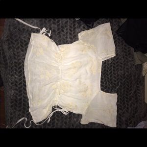 White floral shirt with white flowers